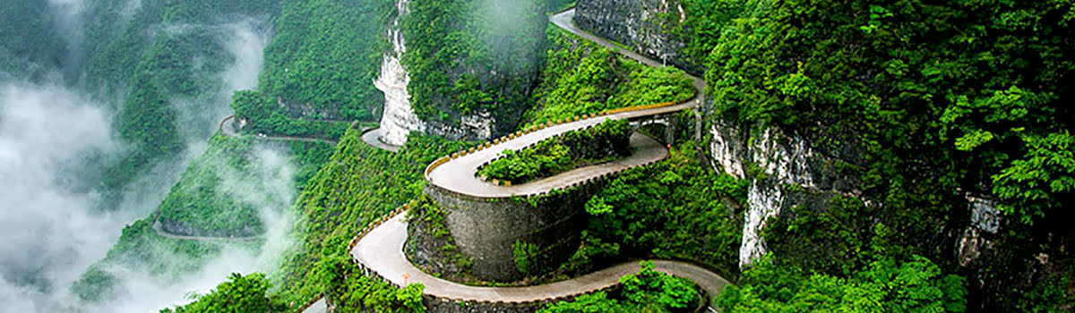 Winding roads through mountain jungle in China