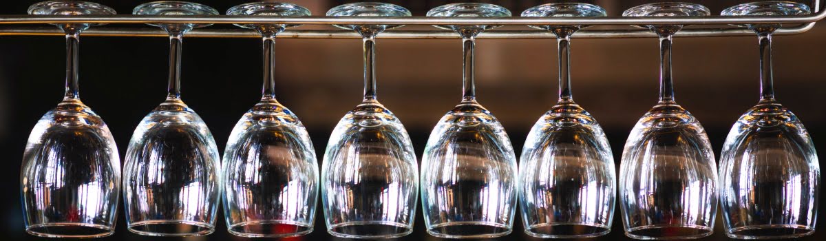 https://www.agoda.com/wp-content/uploads/2019/01/Tokyo-bar-city-guides-Tokyo-Japan-Featured-photo-1200x350-wine-glasses-hanging-on-a-bar-rack.jpg