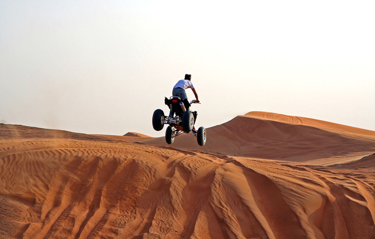 Desert Safari Dubai-camel rides-Bedouin camping-UAE-Quad Biking-sand dunes