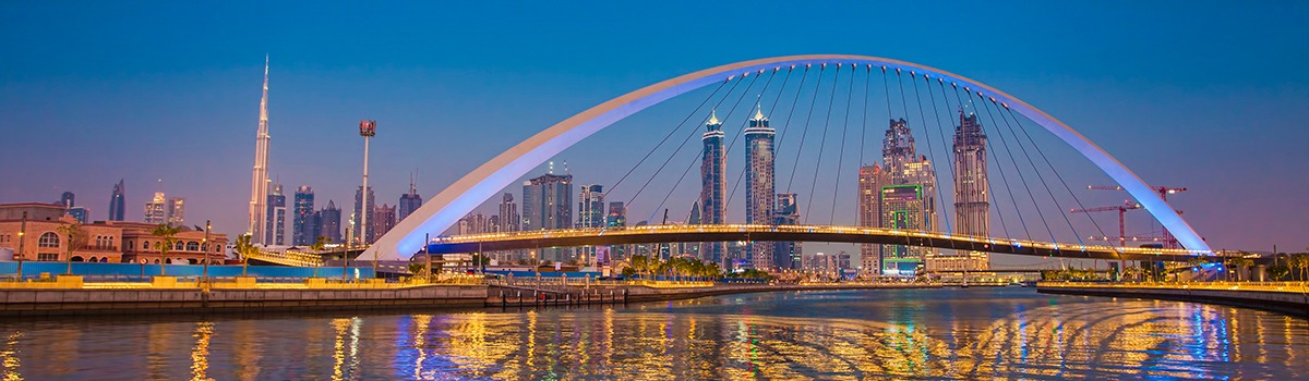 Dubai,City,Skyline,At,Night.,View,Of,Tolerance,Bridge