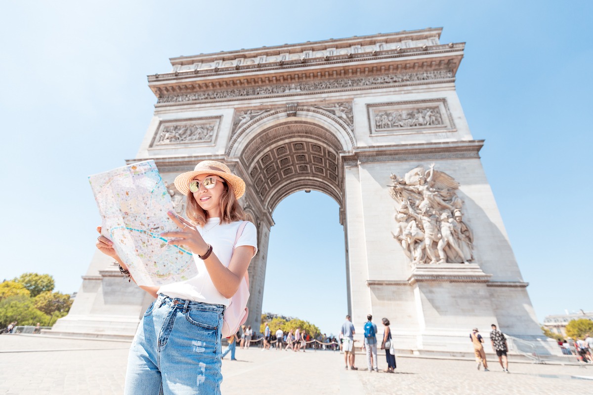 Female tourist at Arc de Triomphe