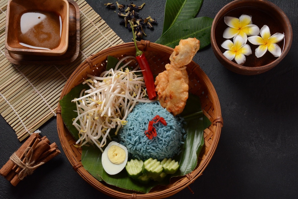Nasi kerabu, blue-colored rice, traditional Malay dish