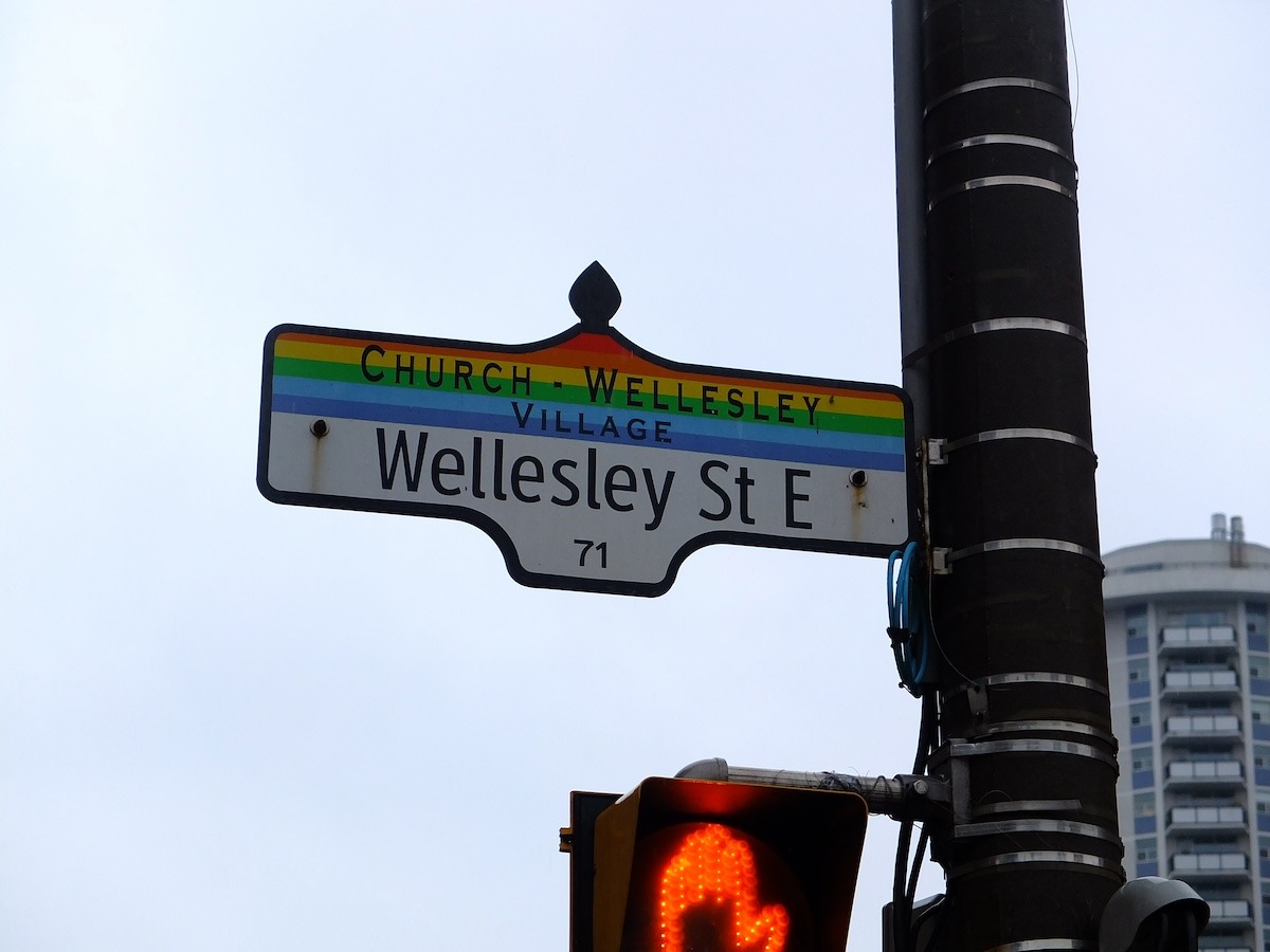 rainbow street sign in Toronto