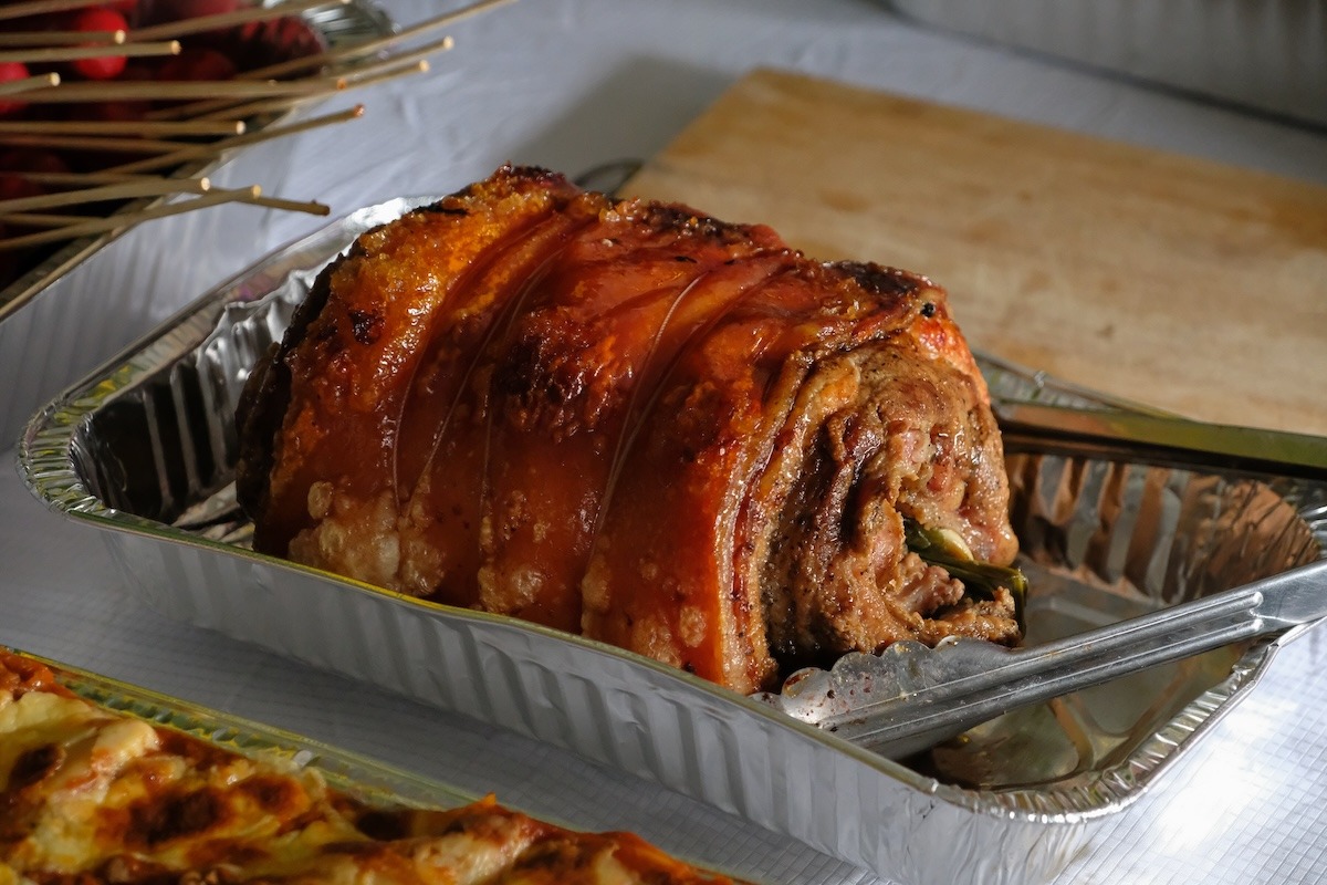 Roasted crispy lechon belly-traditional Filipino dish Experiencing Christmas in the Philippines