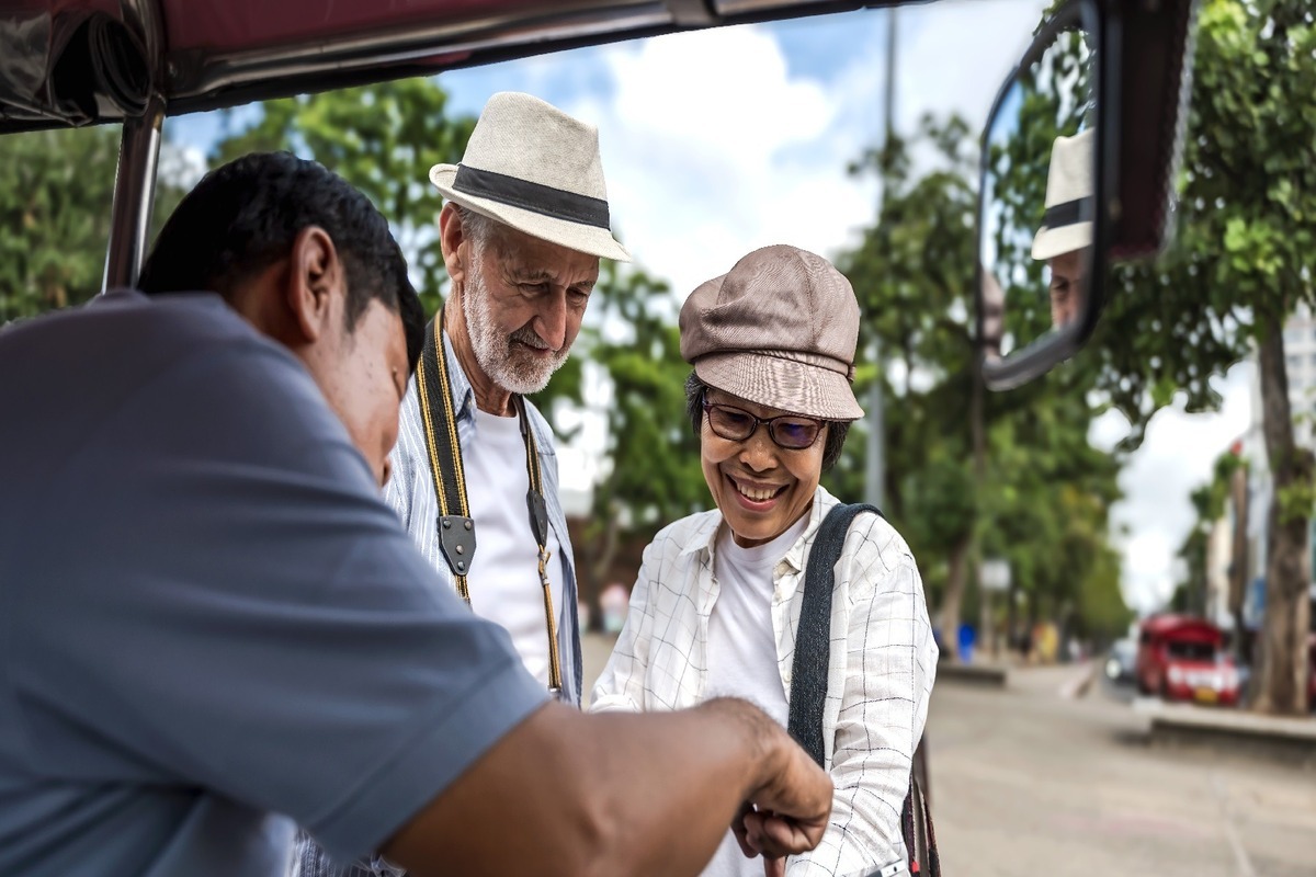 Tourists Using Tuktuk Tourists Using Tuktuk